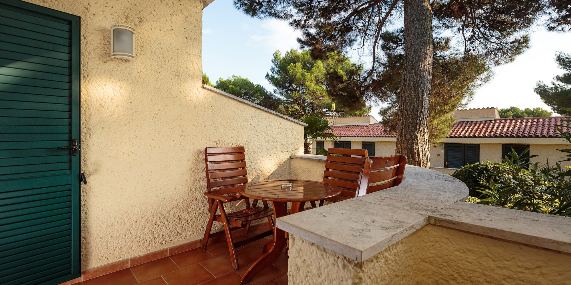 a table and chairs on a patio
