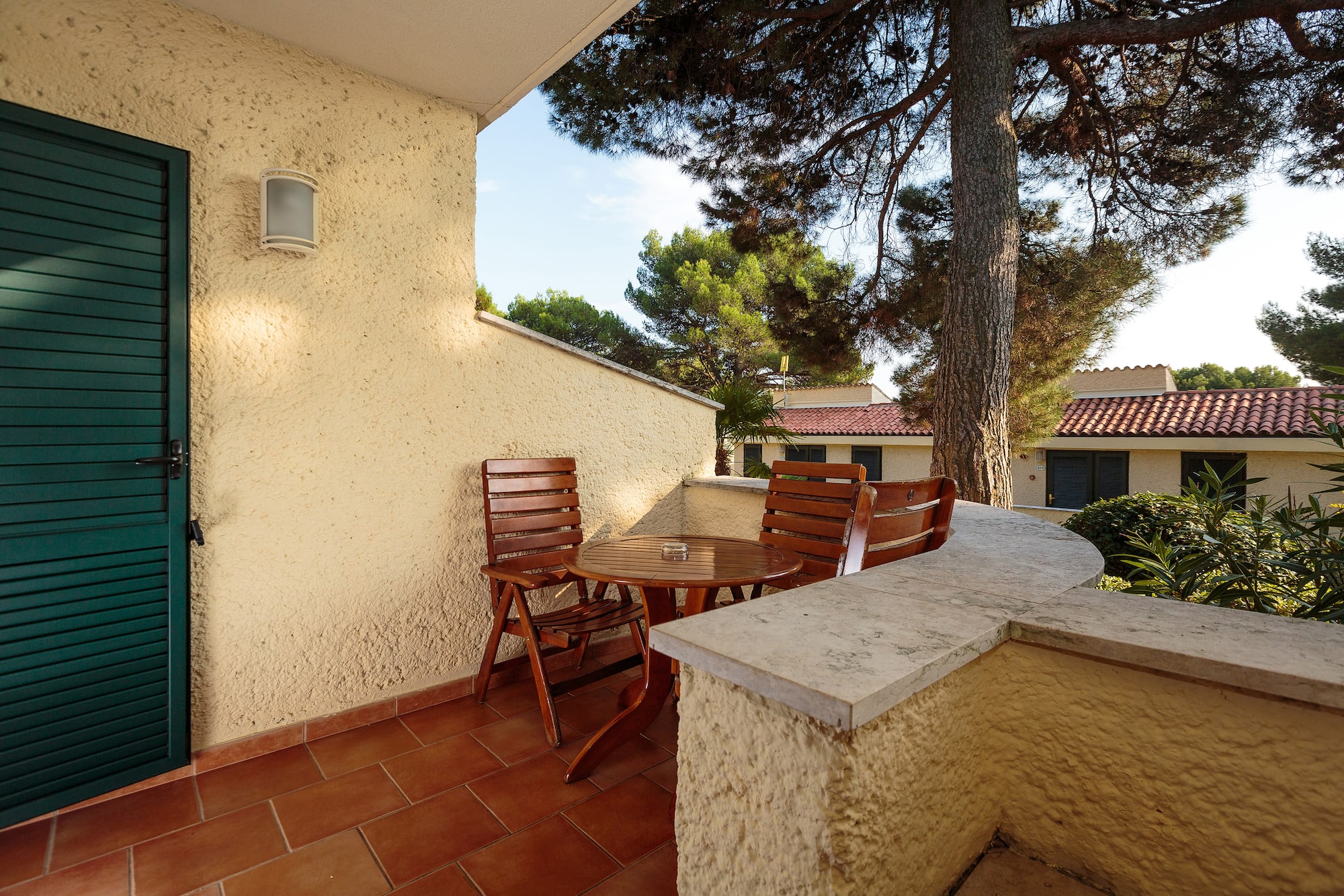 a table and chairs on a patio