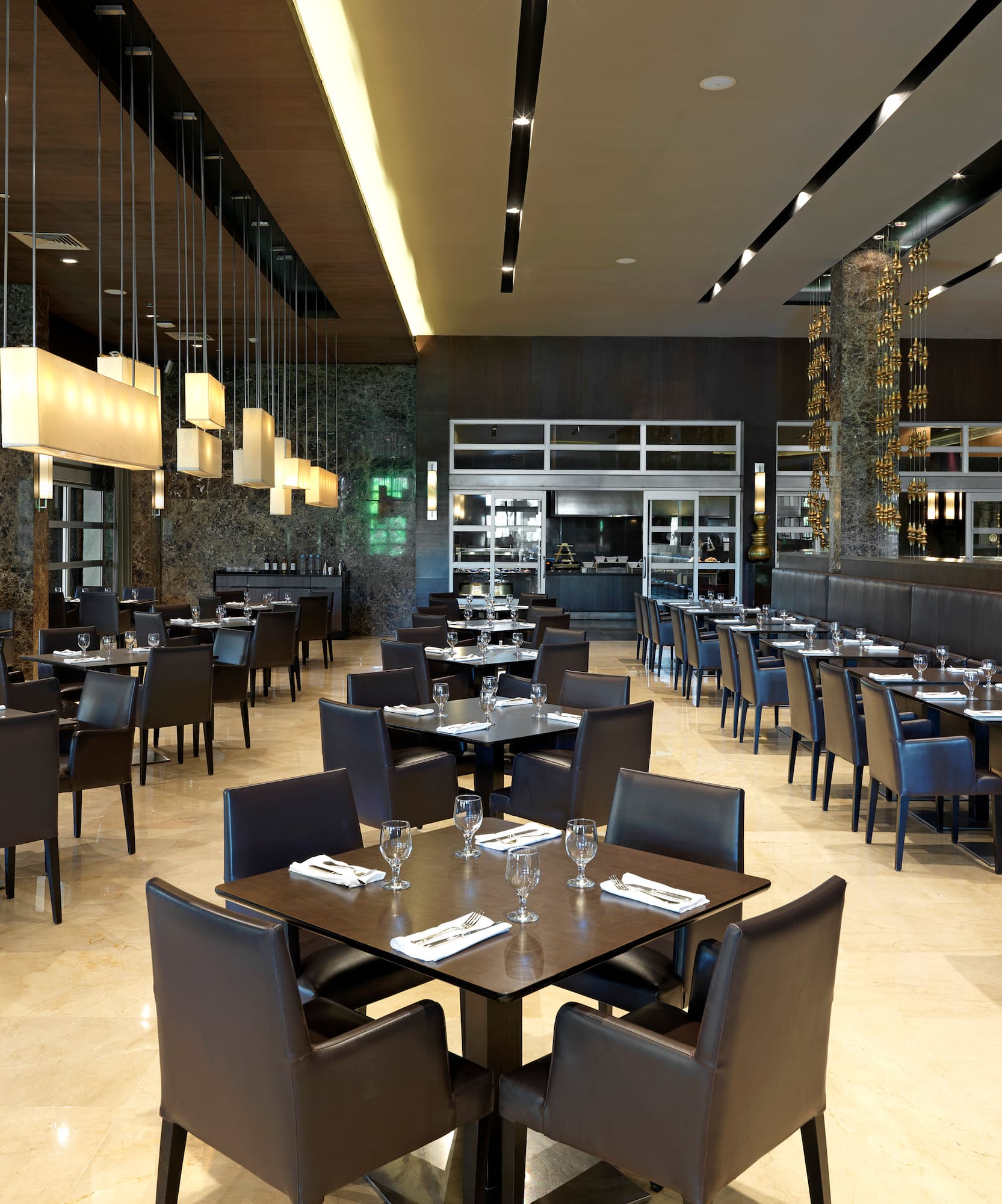 a restaurant with tables and chairs