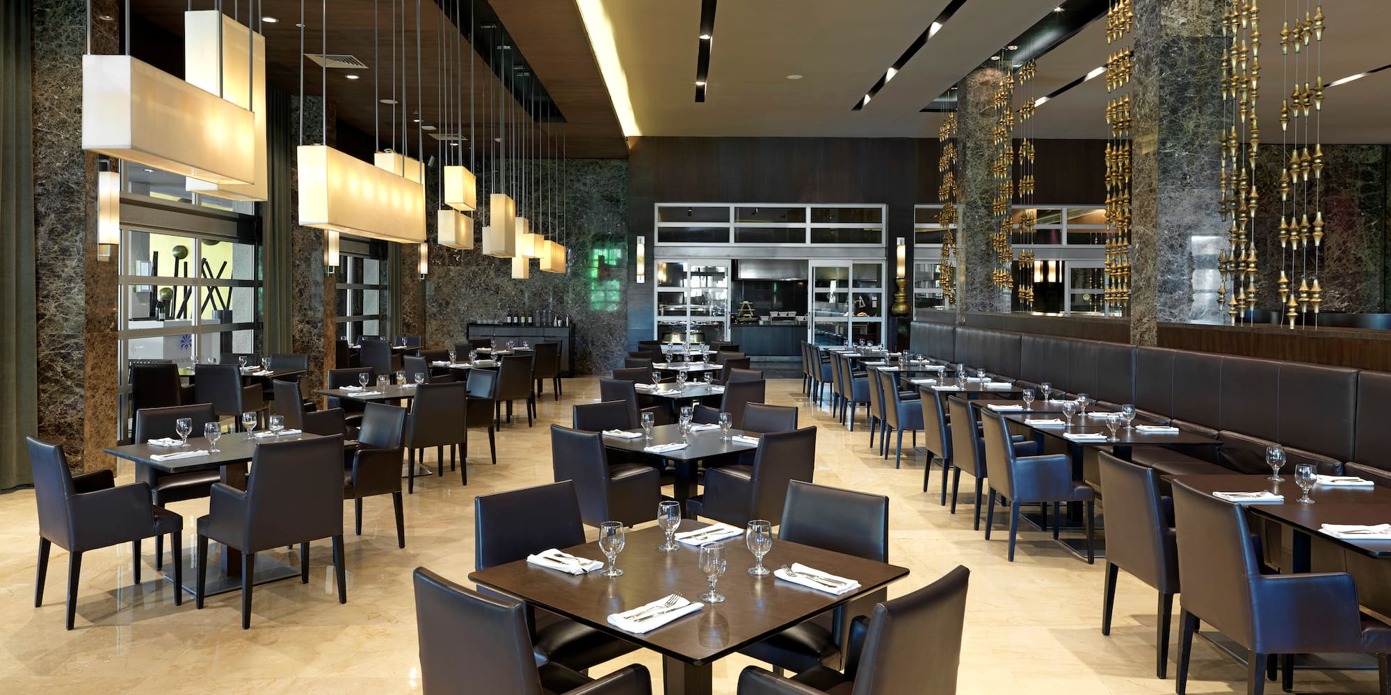 a restaurant with tables and chairs