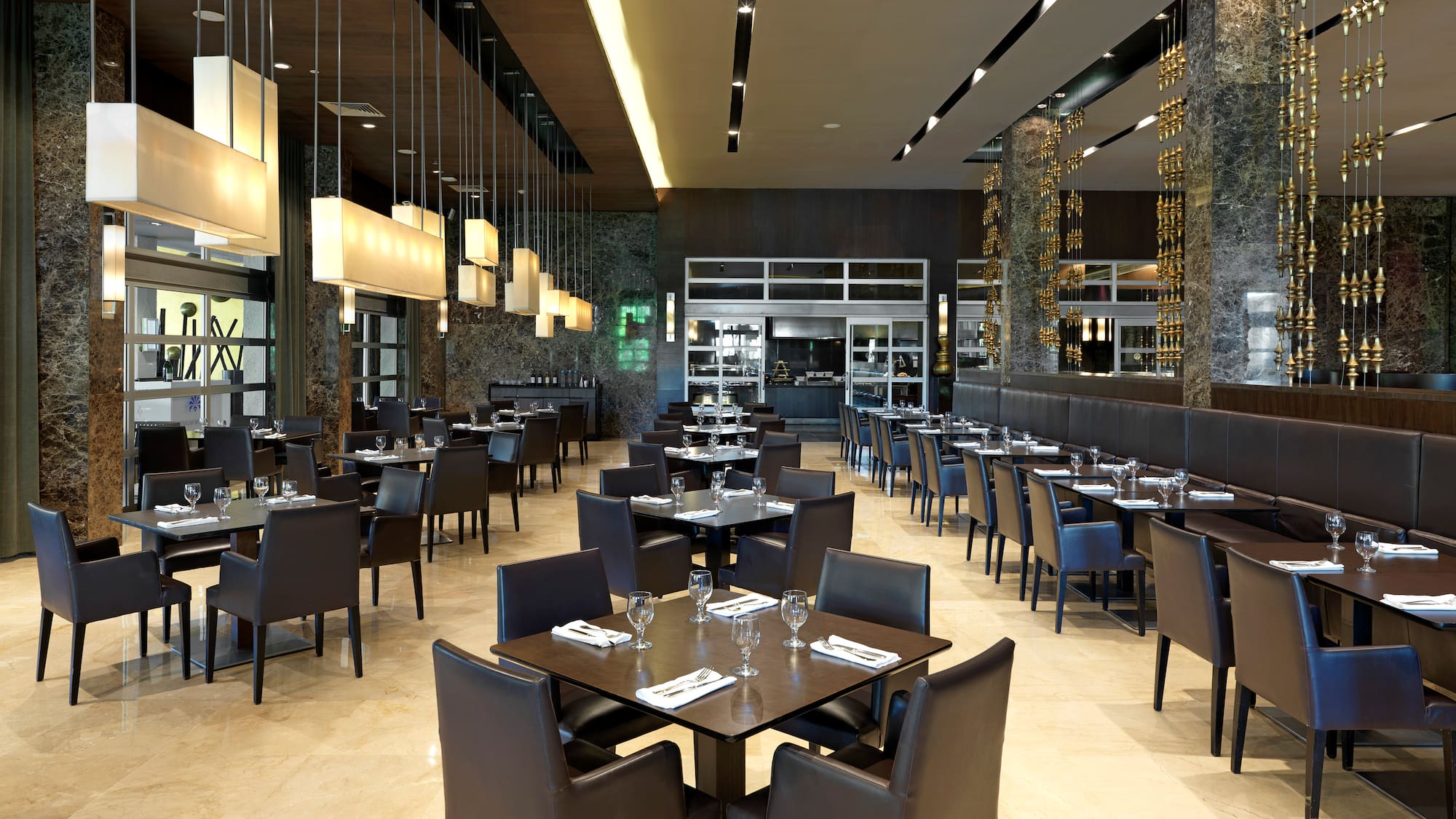 a restaurant with tables and chairs