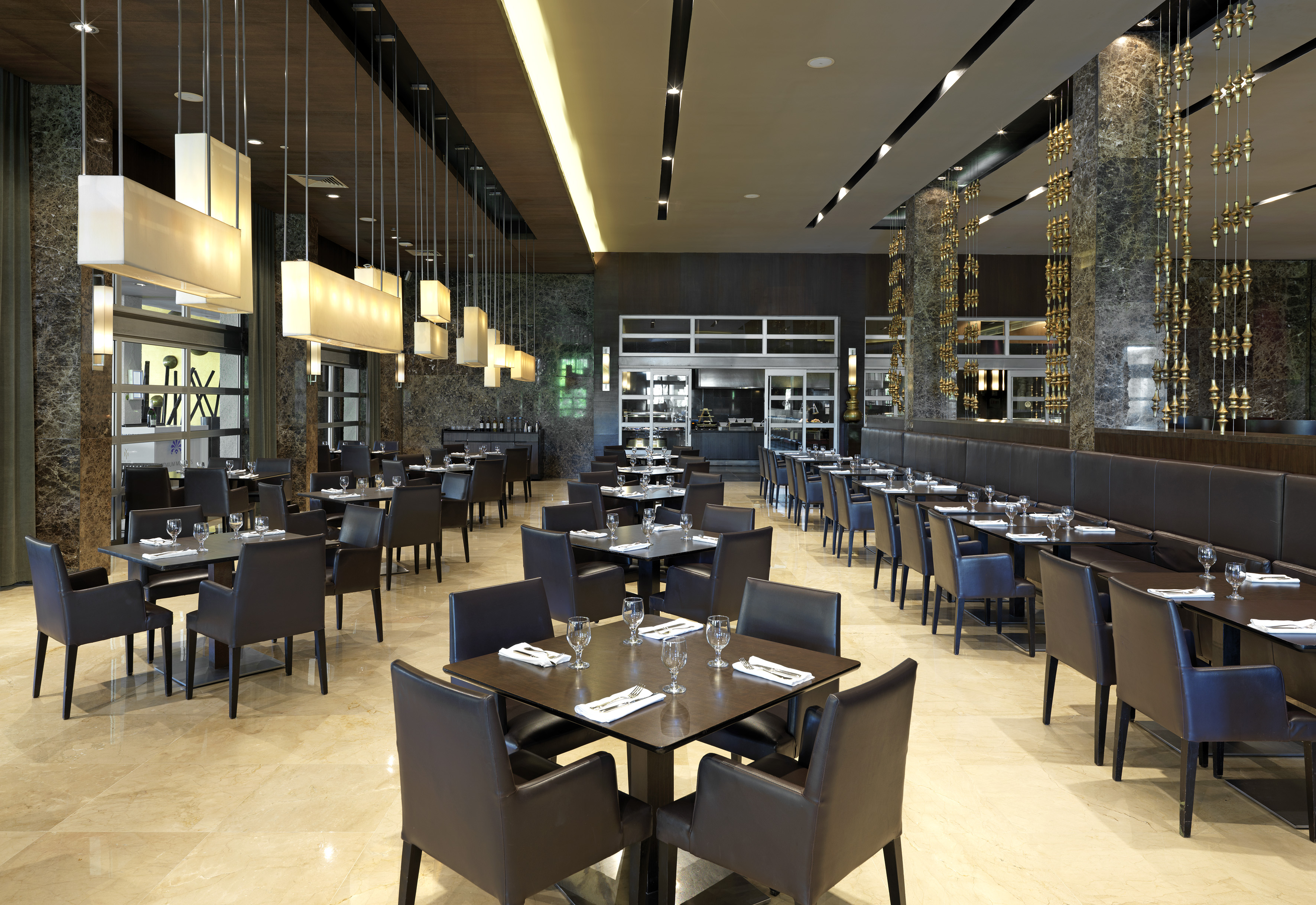 a restaurant with tables and chairs