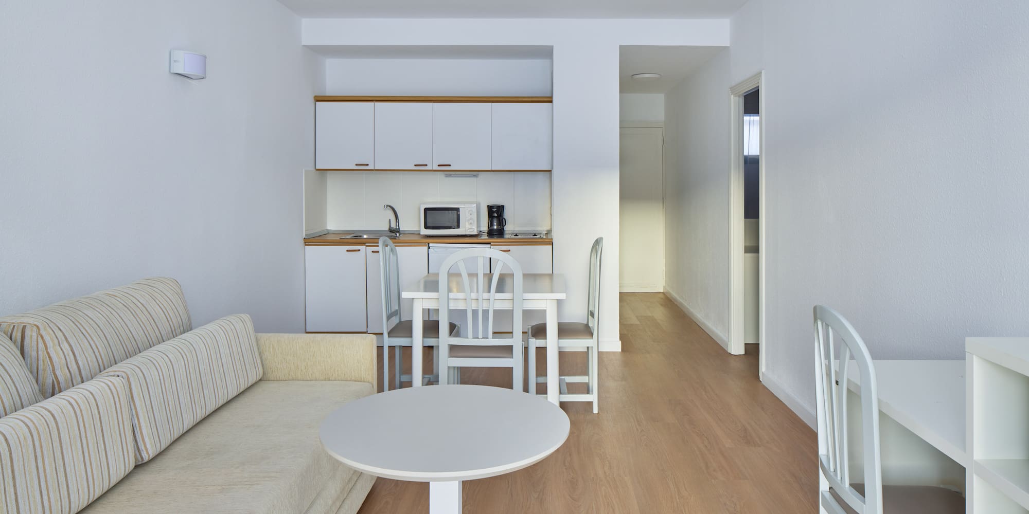 a living room with a couch and table