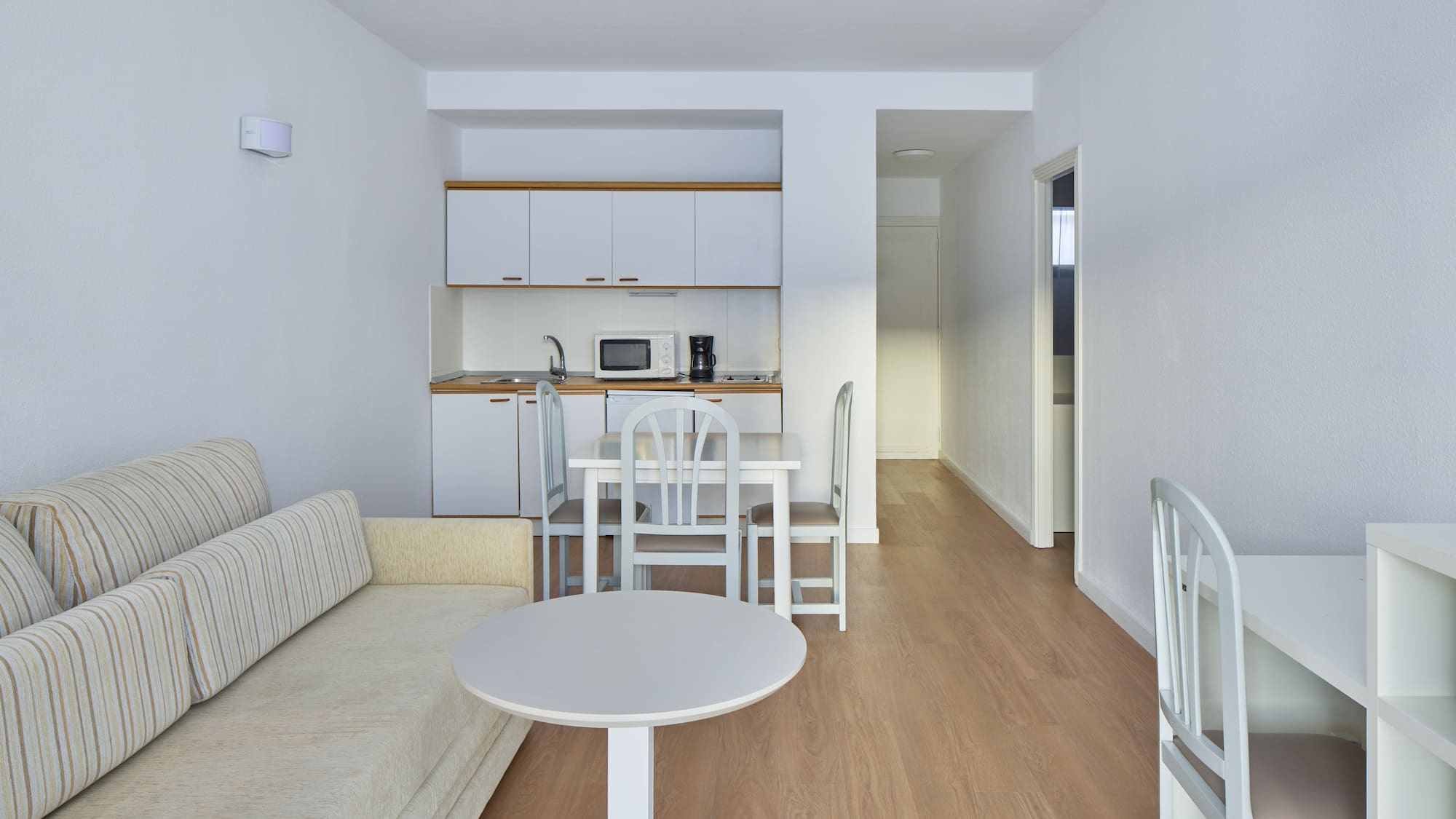 a living room with a couch and table