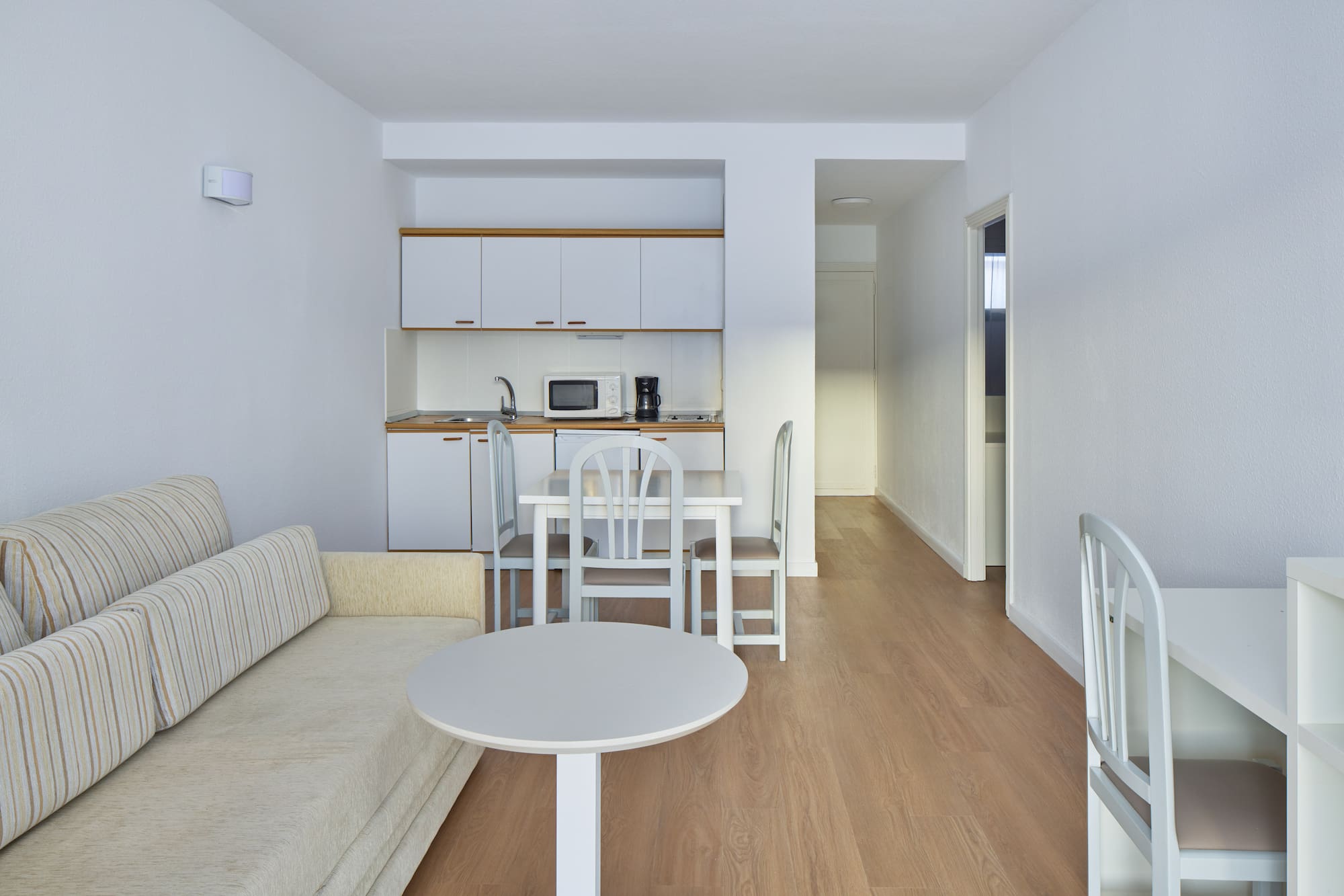 a living room with a couch and table