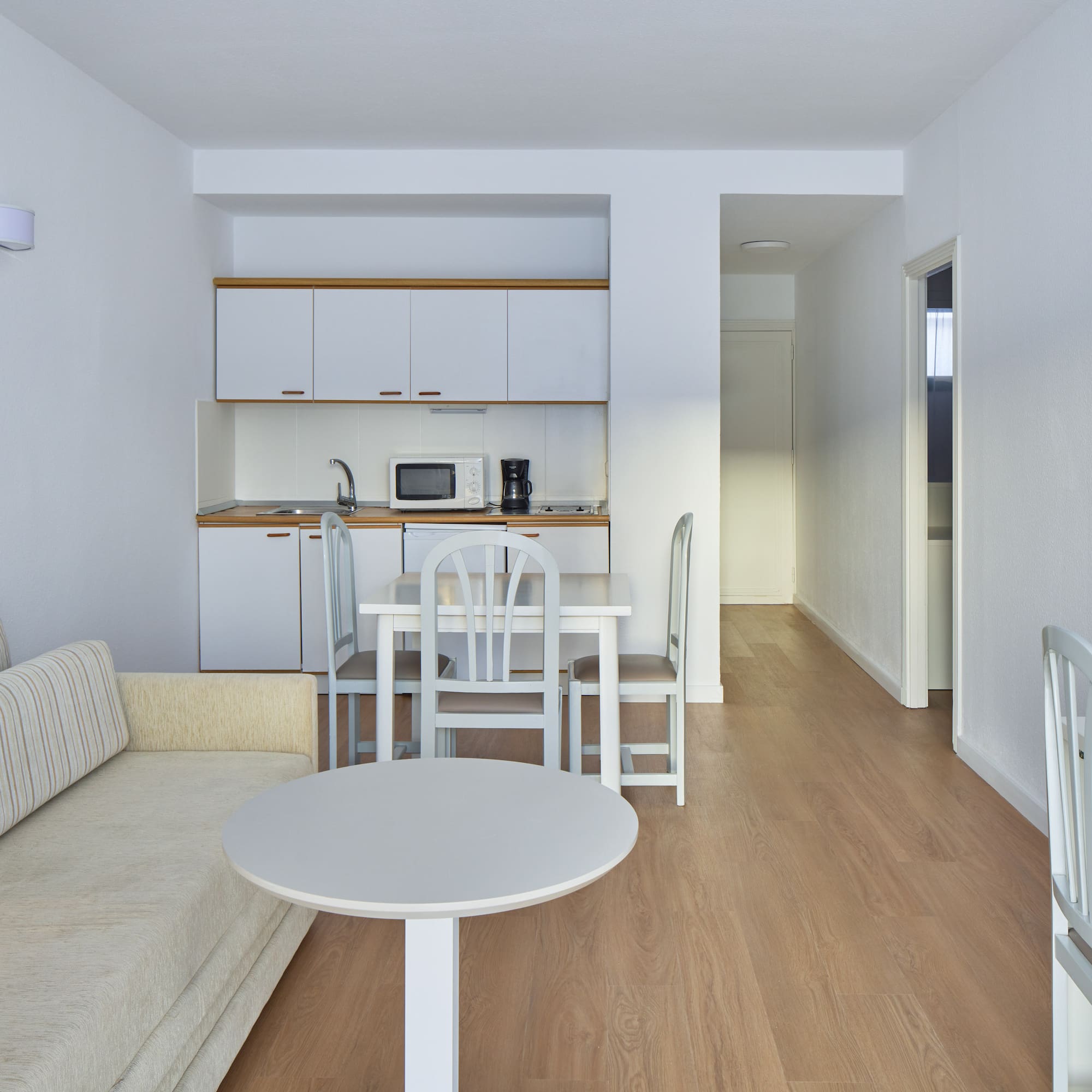 a living room with a couch and table