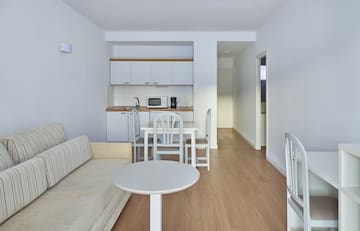 a living room with a couch and table