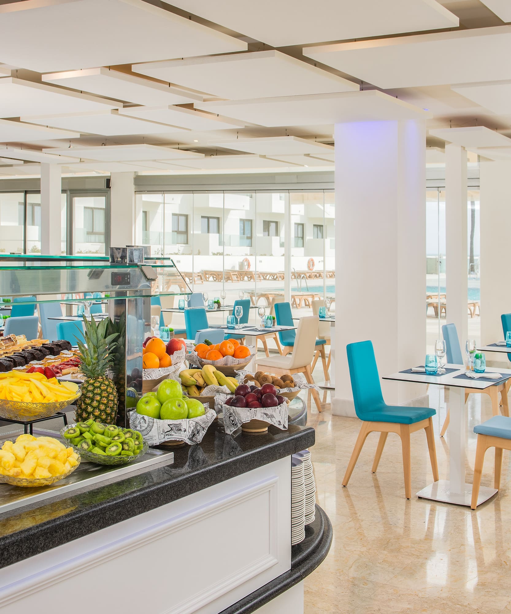 a buffet with fruit on the counter