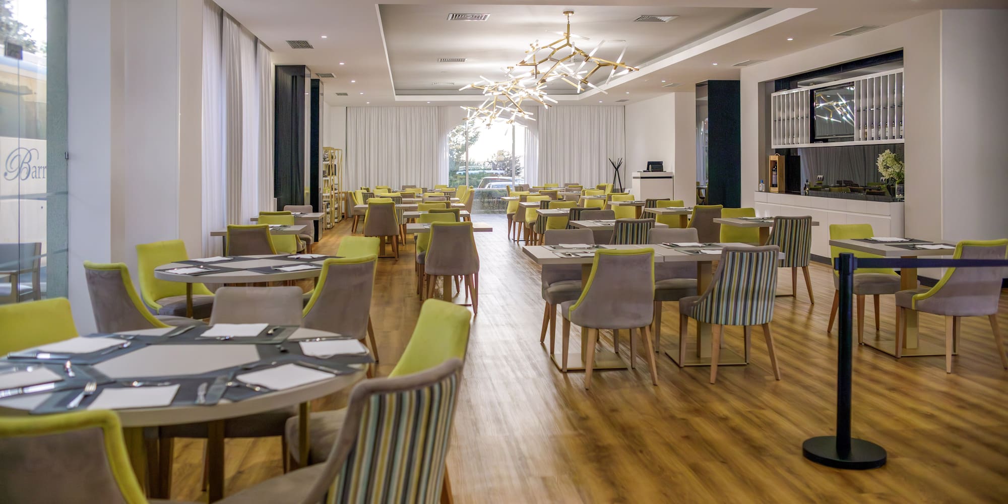 a room with tables and chairs