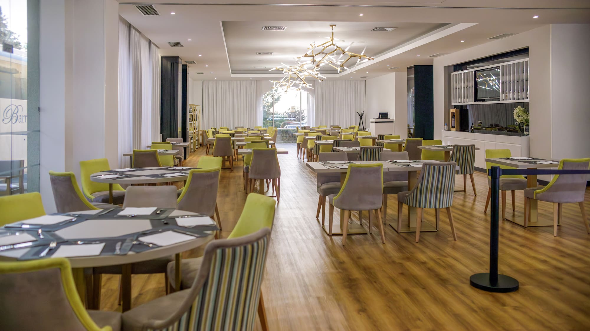 a room with tables and chairs