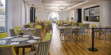 a room with tables and chairs