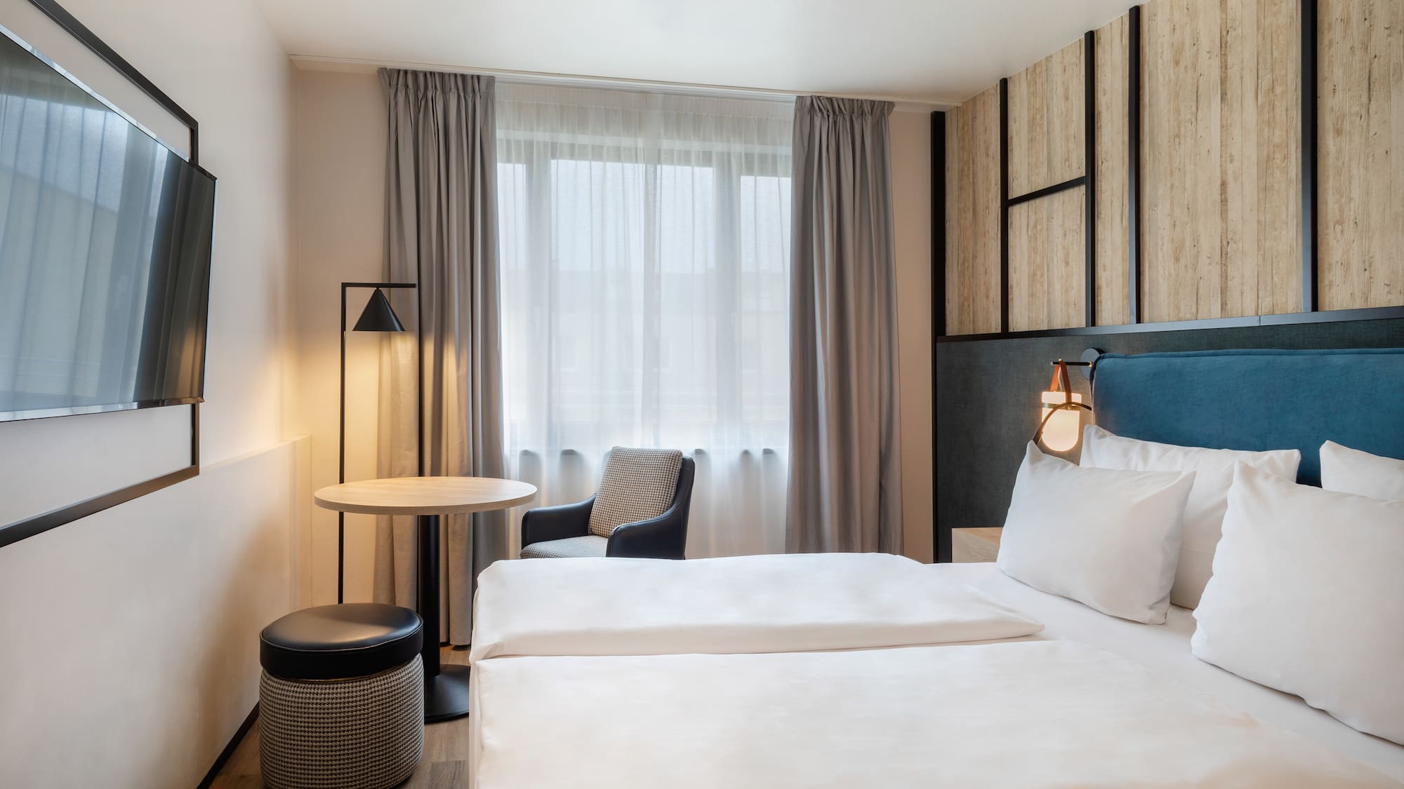 a room with a bed and a table