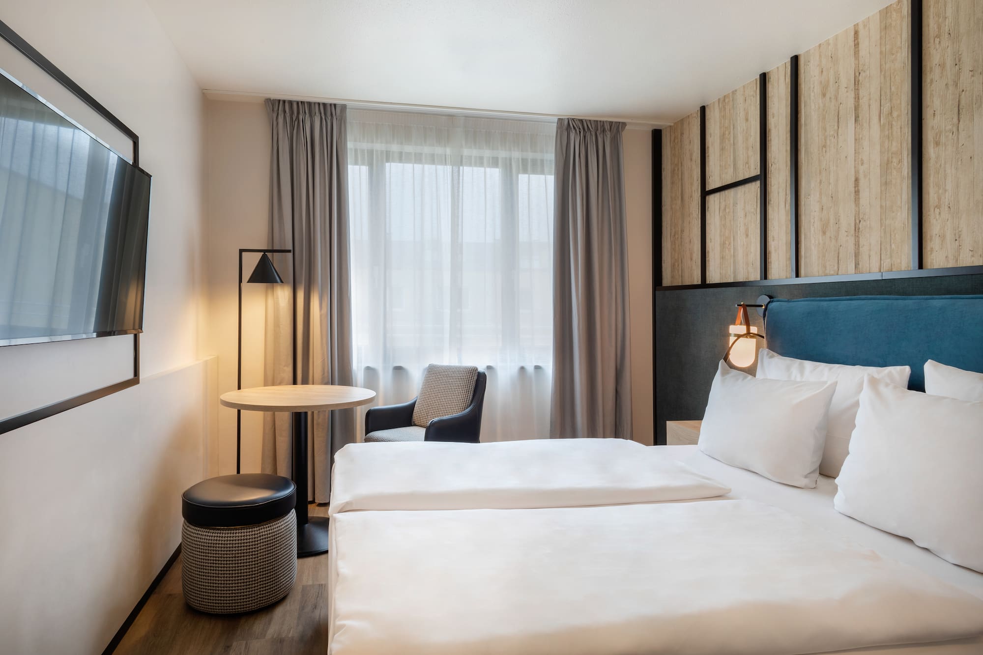 a room with a bed and a table