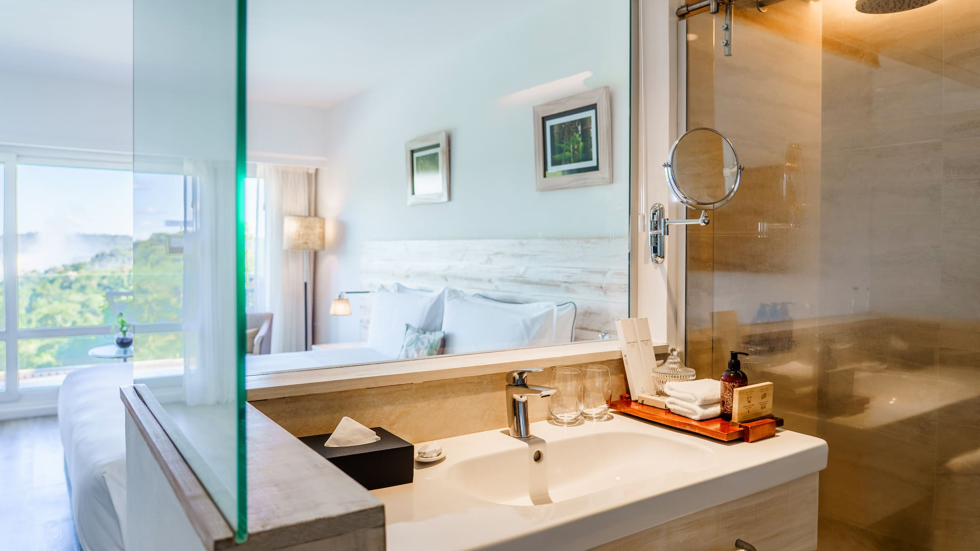 a bathroom with a glass shower door