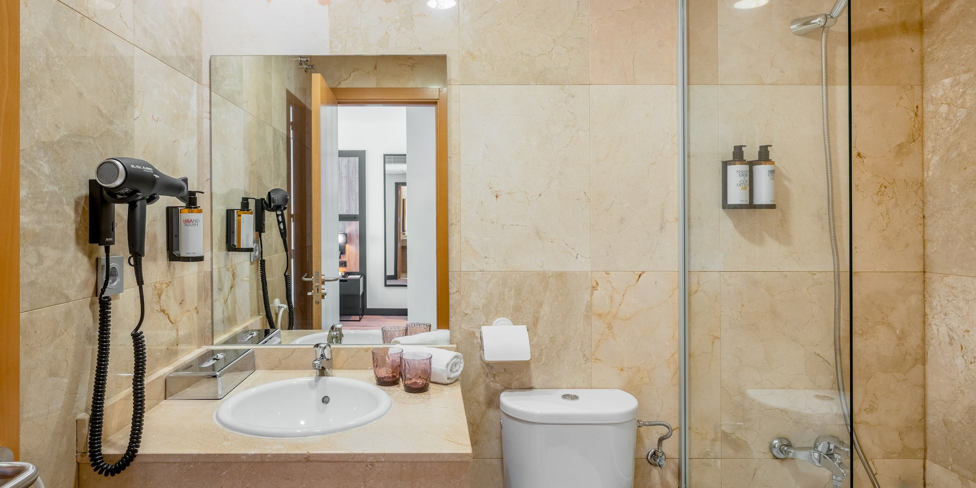 a bathroom with a sink and a shower