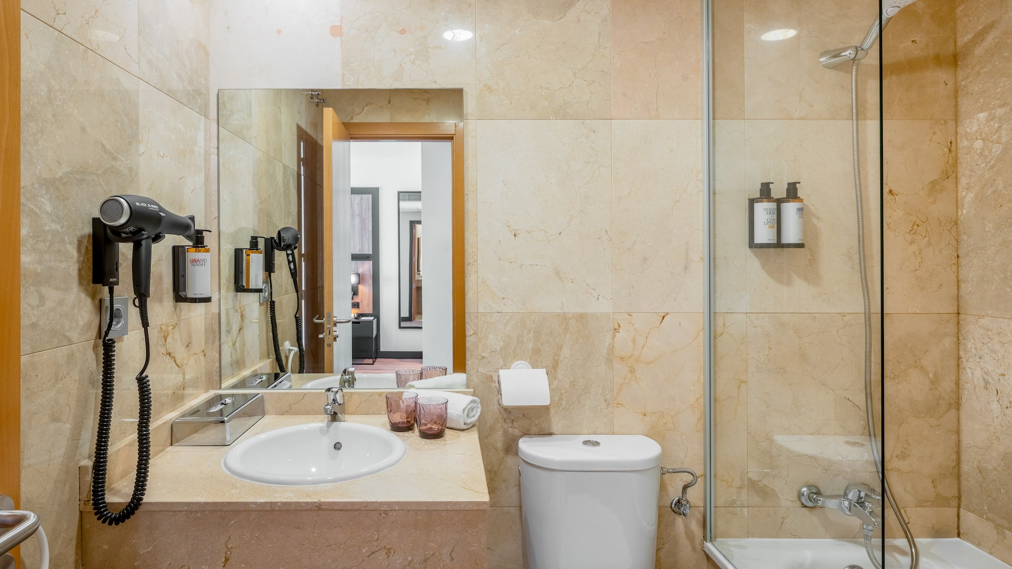a bathroom with a sink and a shower