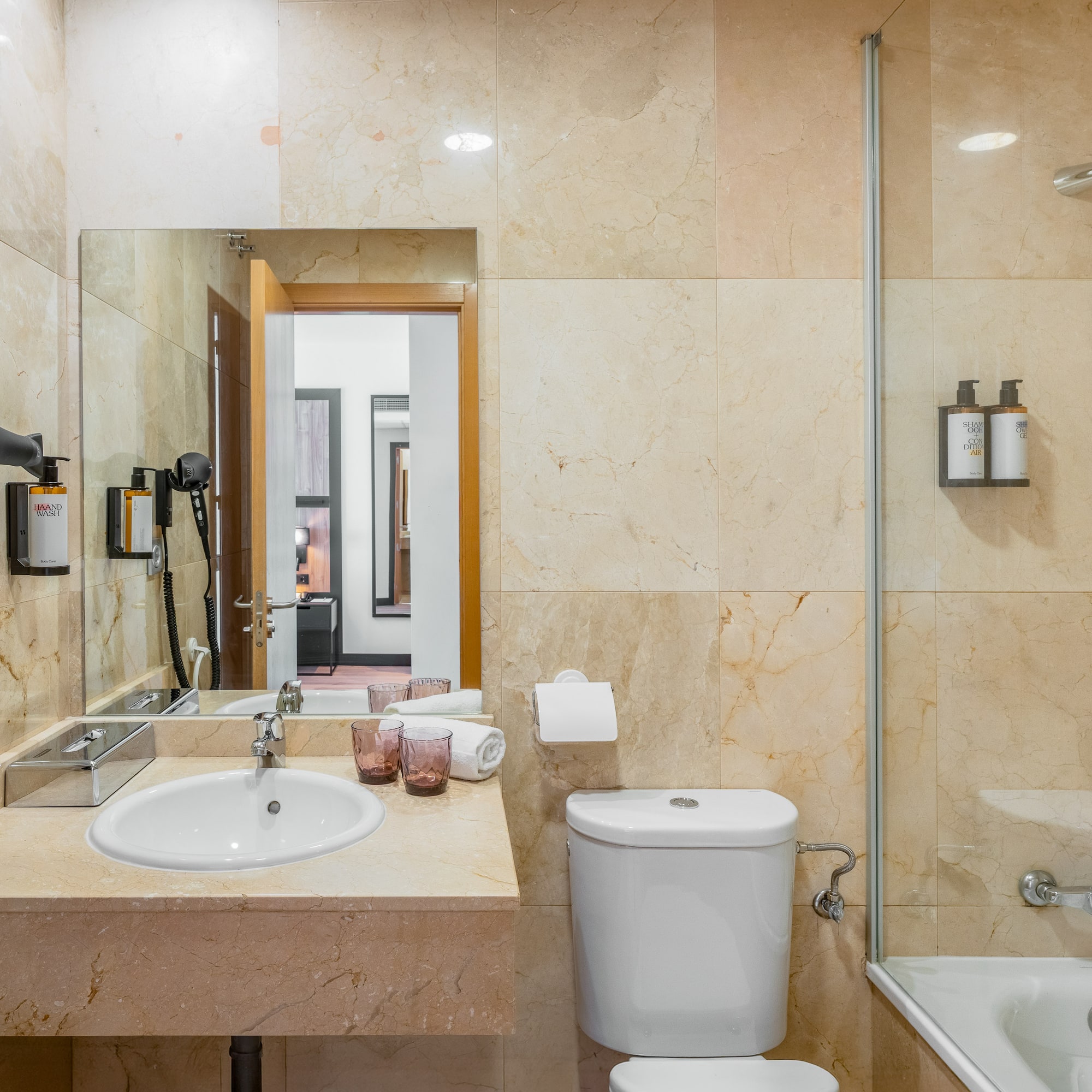 a bathroom with a sink and a shower