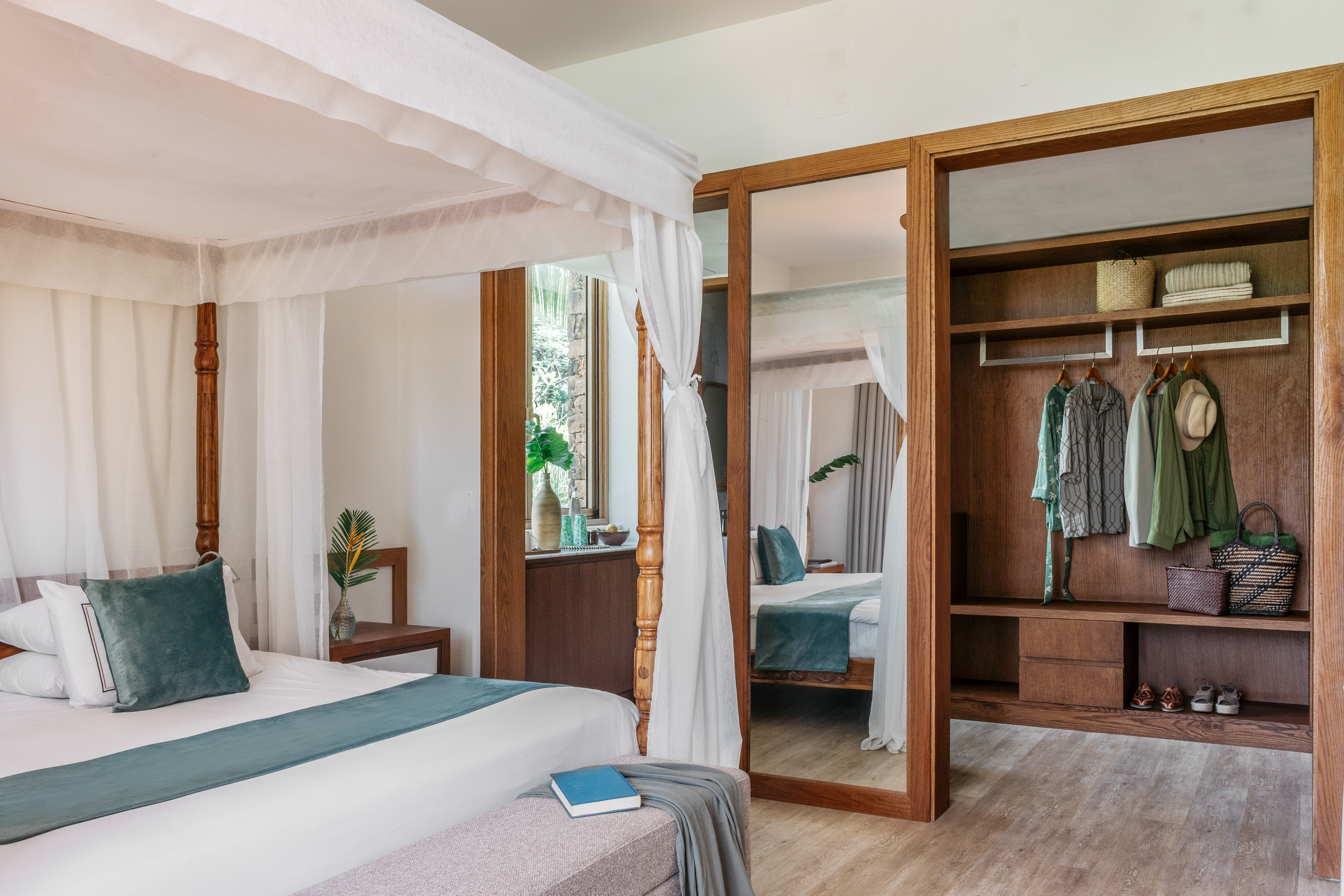 Premium Terrace room with a bed and closets at Melia Zanzibar Hotel