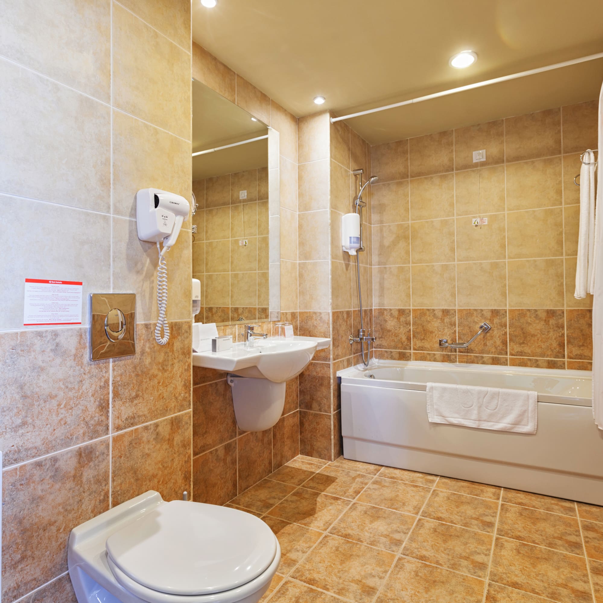 a bathroom with a toilet and sink