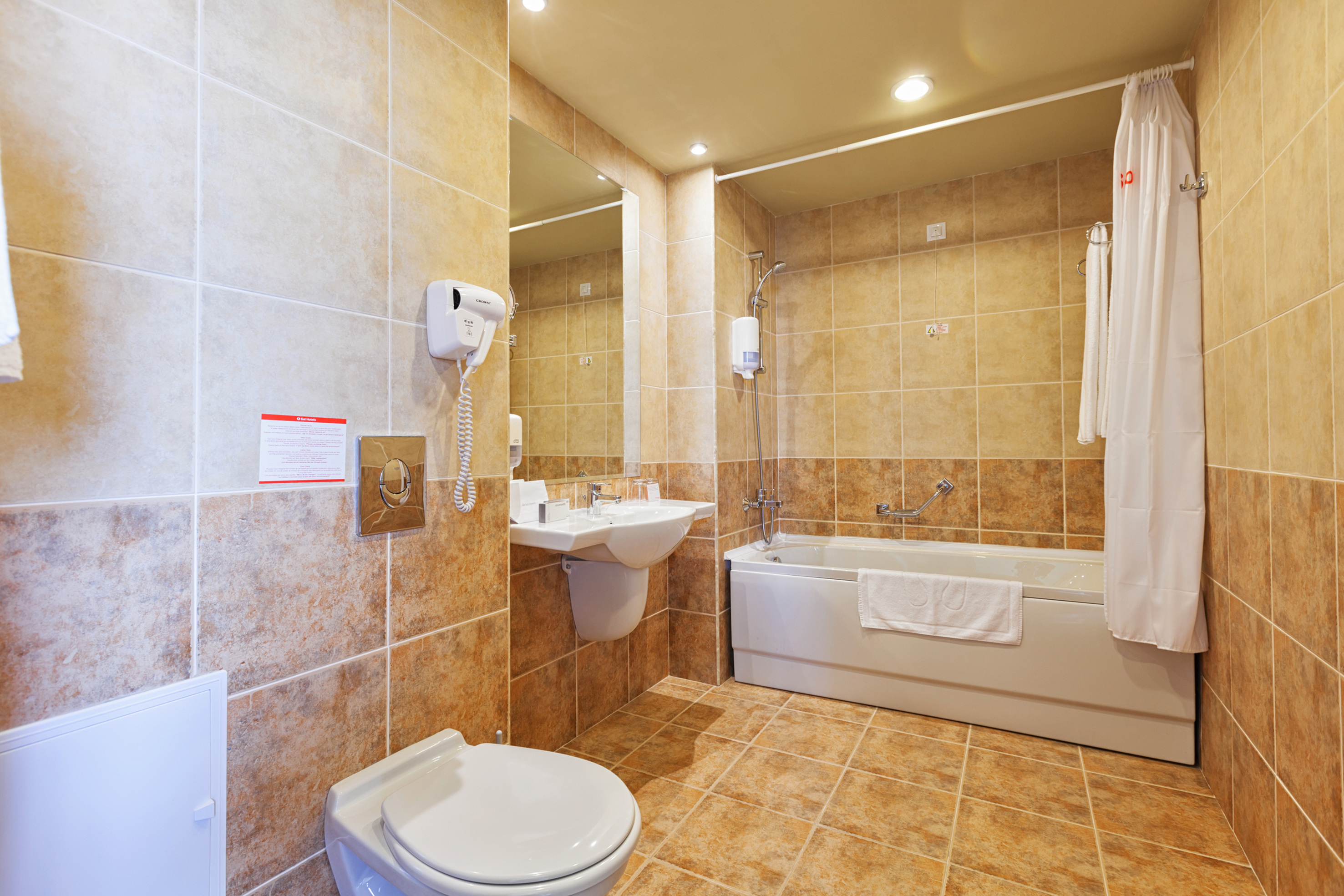 a bathroom with a toilet and sink - SOL Room cu Vedere la Parc - SOL Luna Bay, Obzor