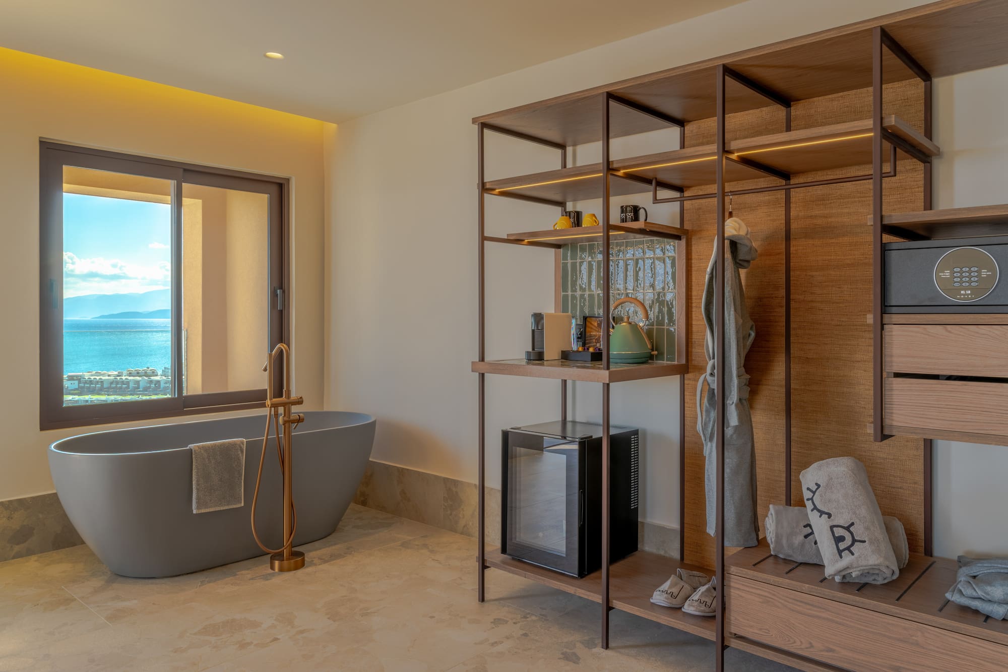 a bathroom with a bathtub and a shelf