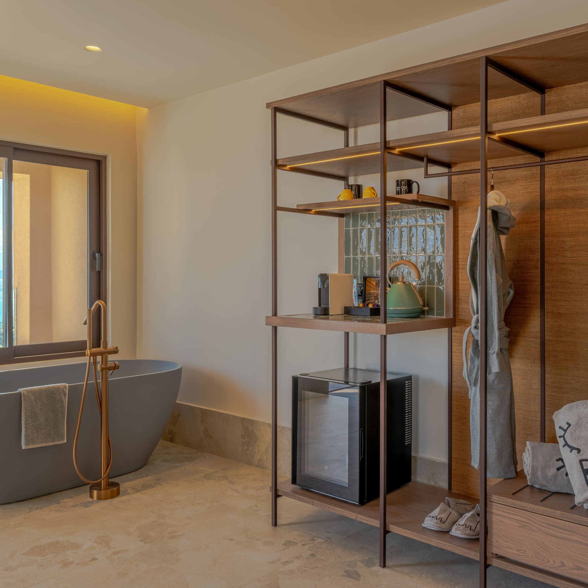 a bathroom with a bathtub and a shelf