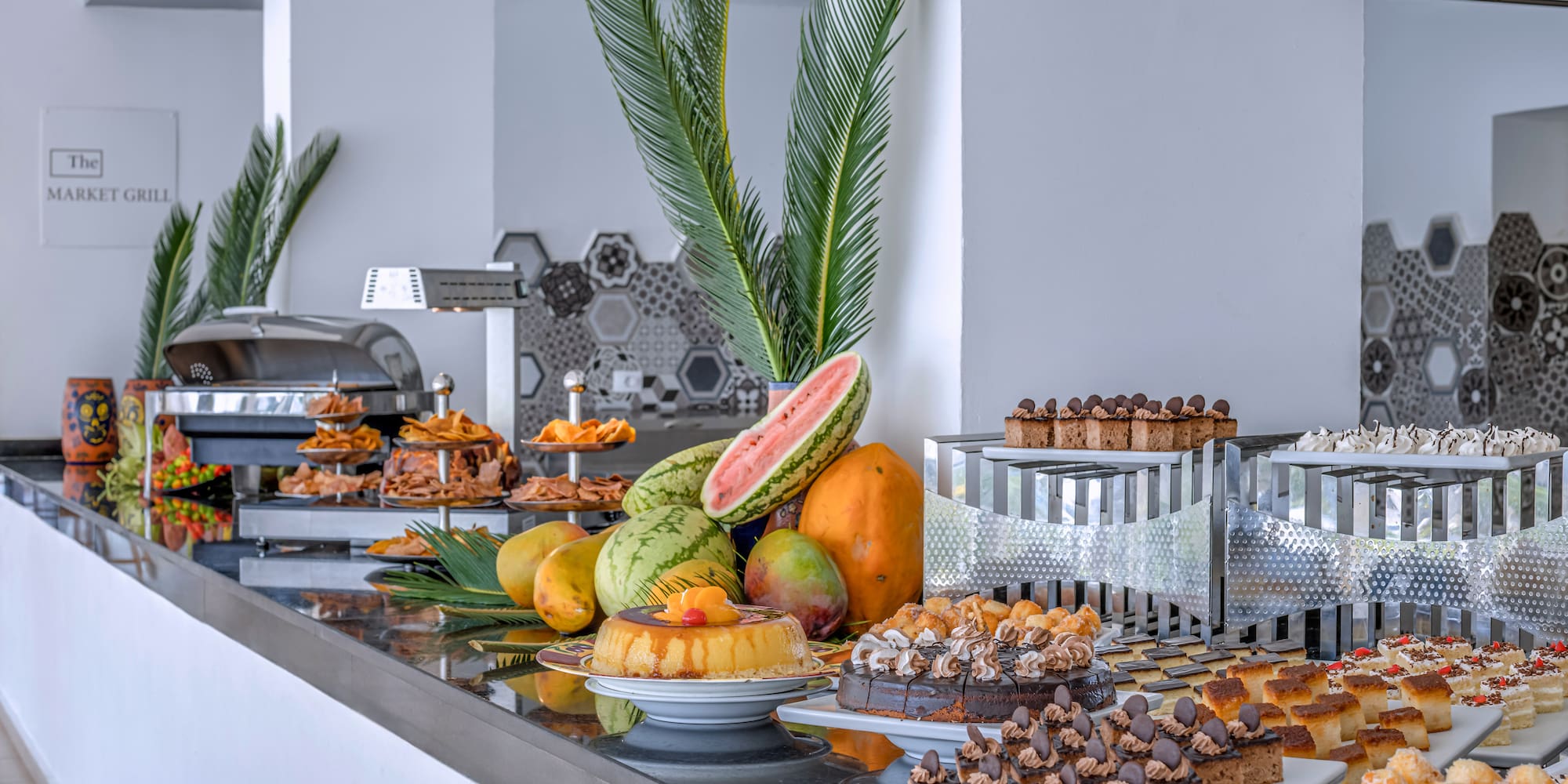 a buffet table with different foods on it