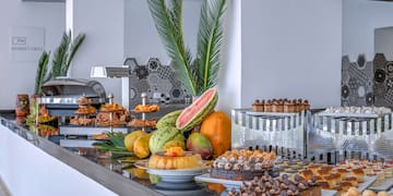 a buffet table with different foods on it