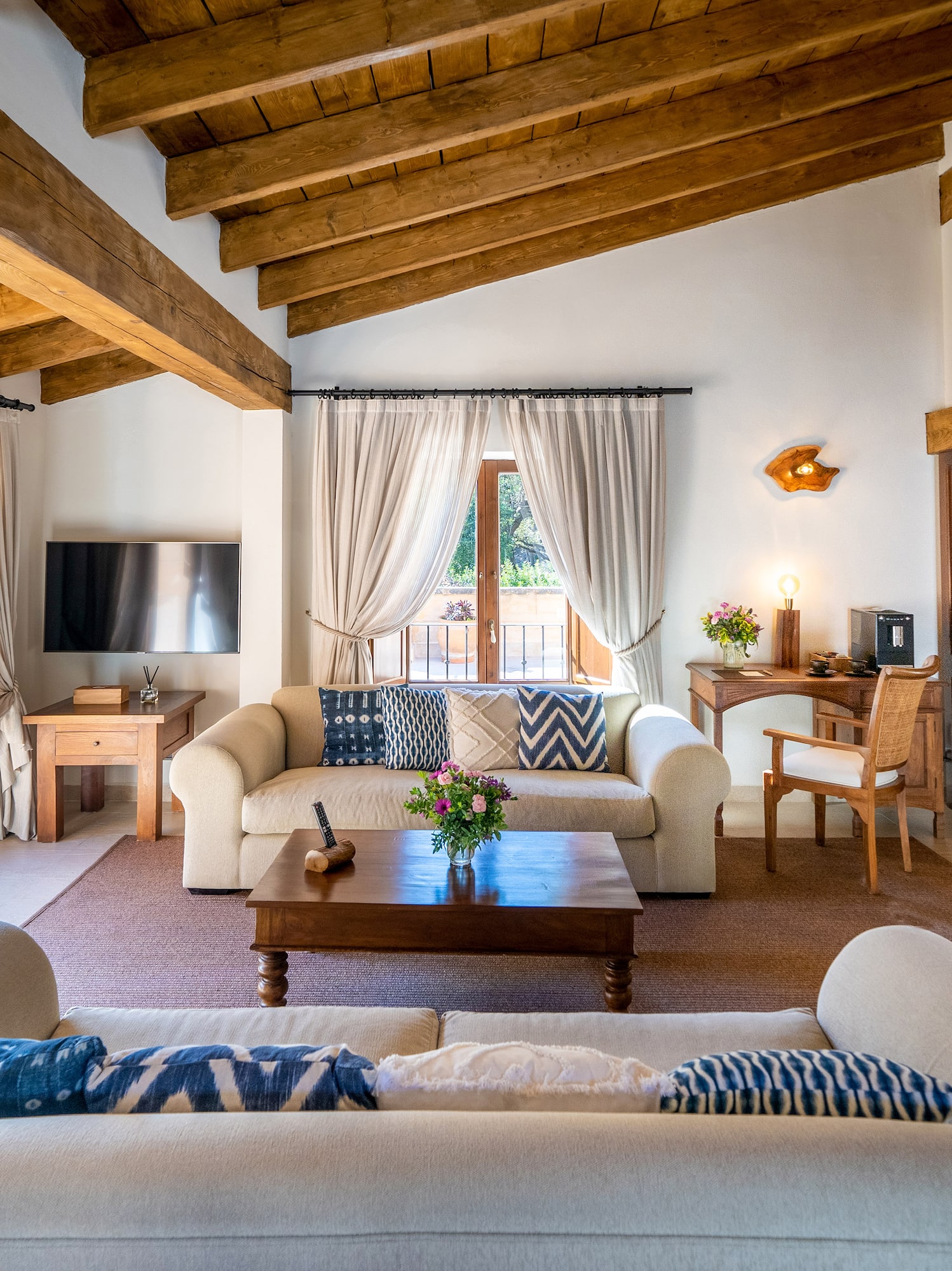 a living room with a couch and a table