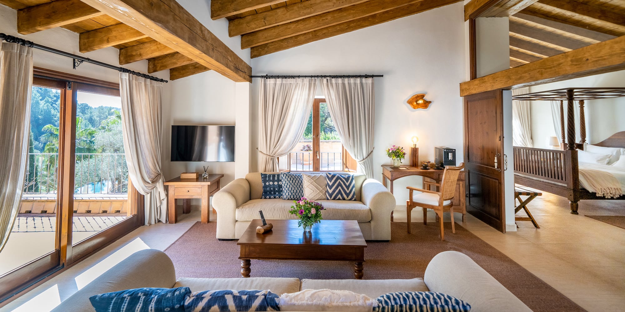 a living room with a couch and a table