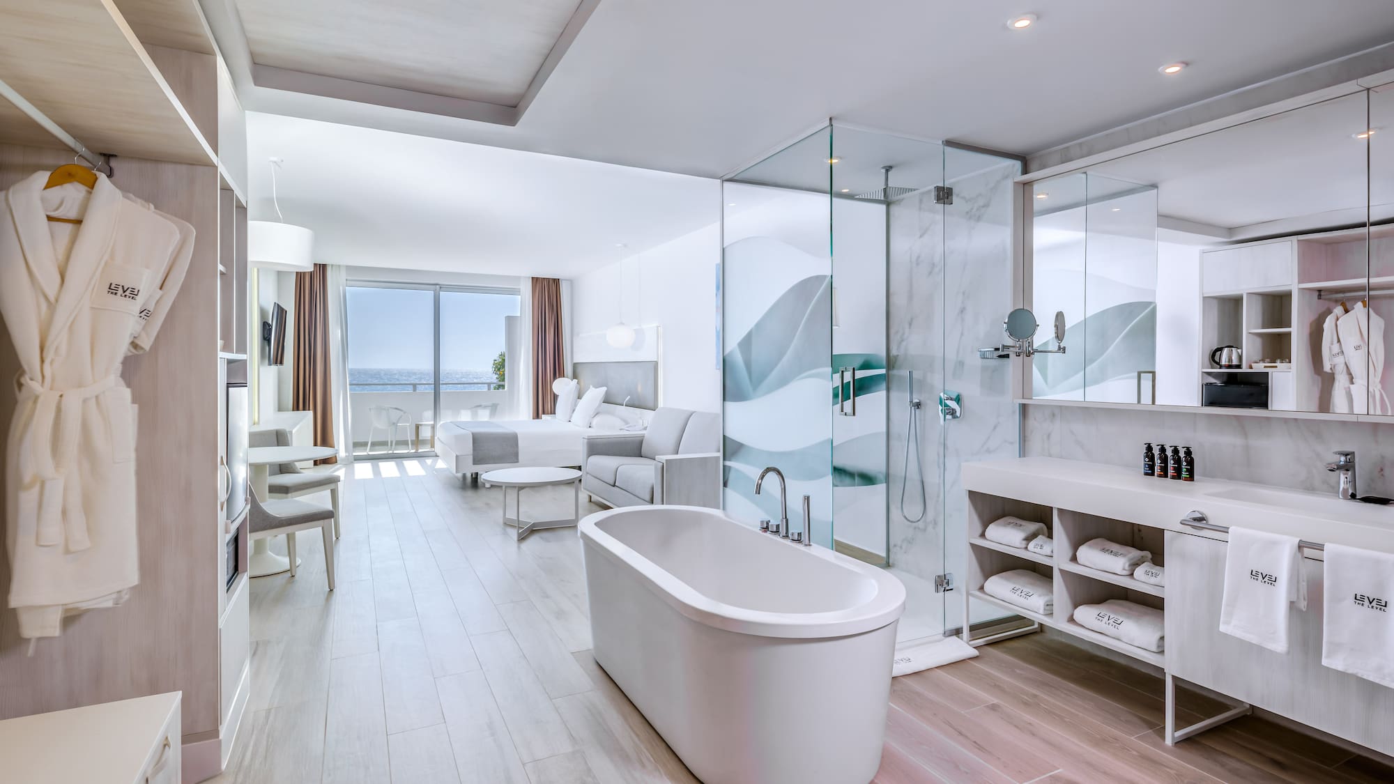 a bathroom with a tub and a shower