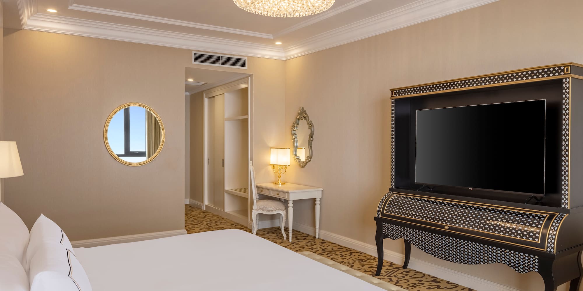 a room with a piano and a bed