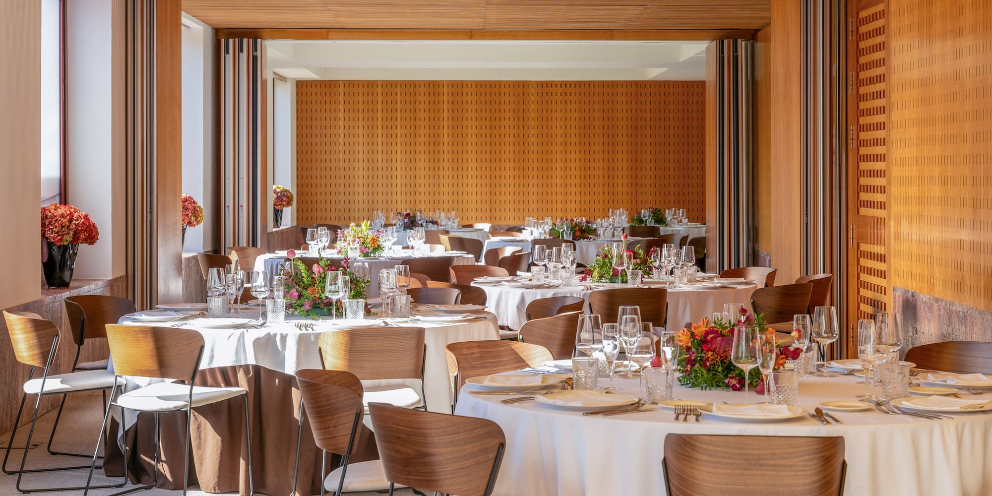 a room with tables and chairs