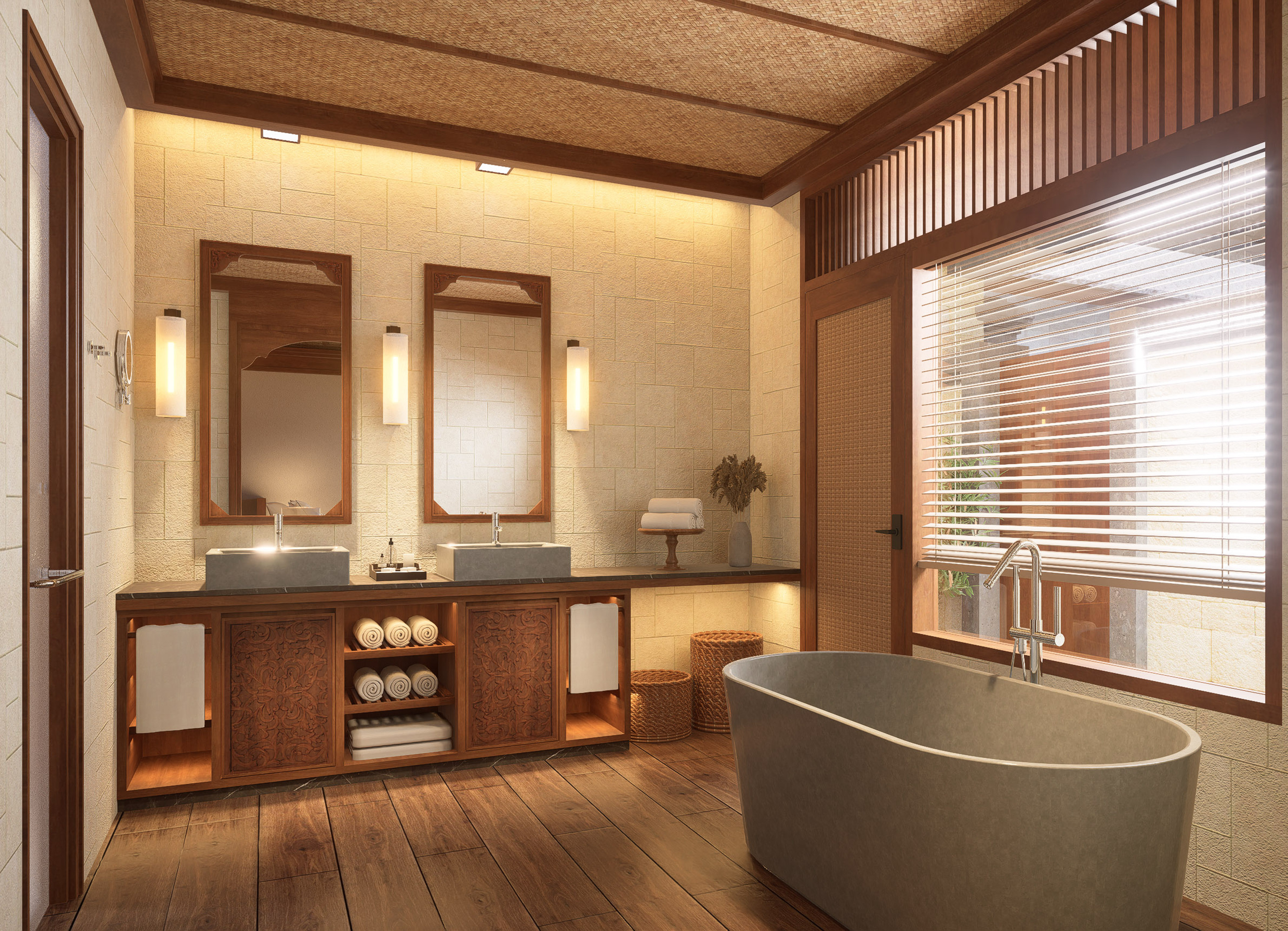 a bathroom with a tub and sinks