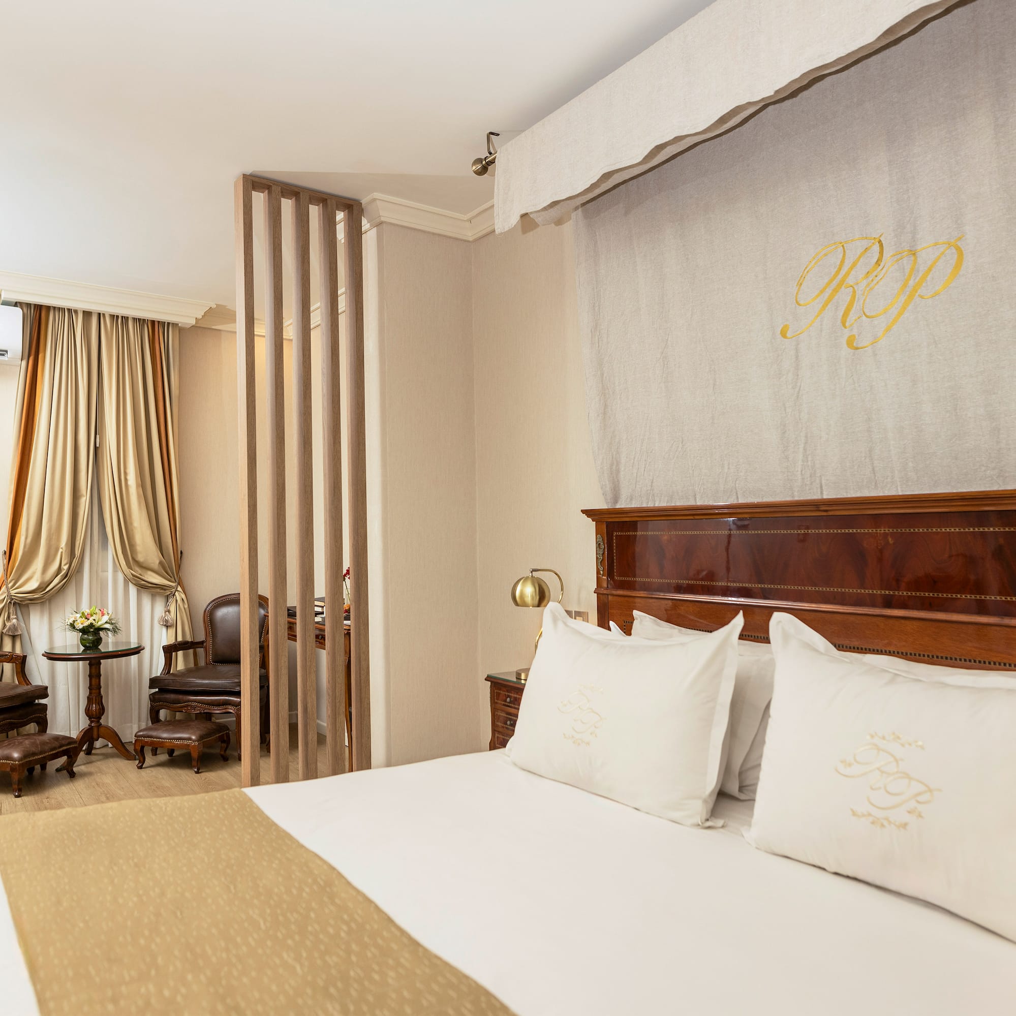 a bed with pillows in a room