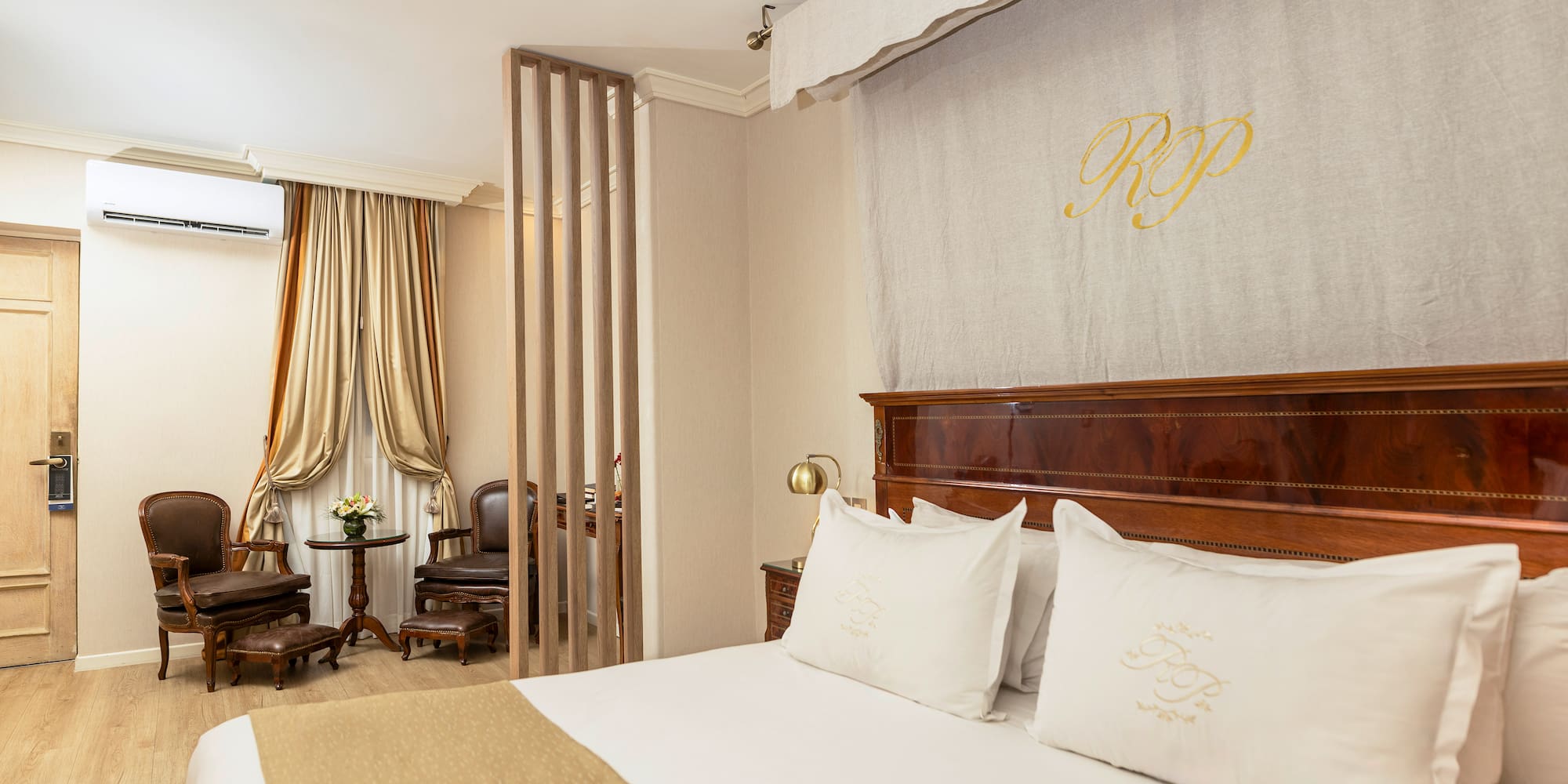 a bed with pillows in a room