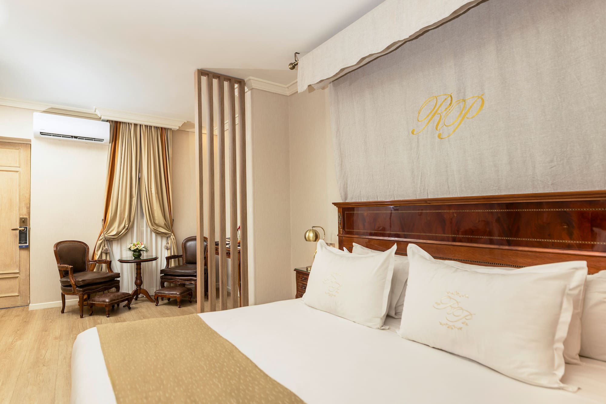 a bed with pillows in a room