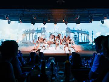 a group of women on a stage