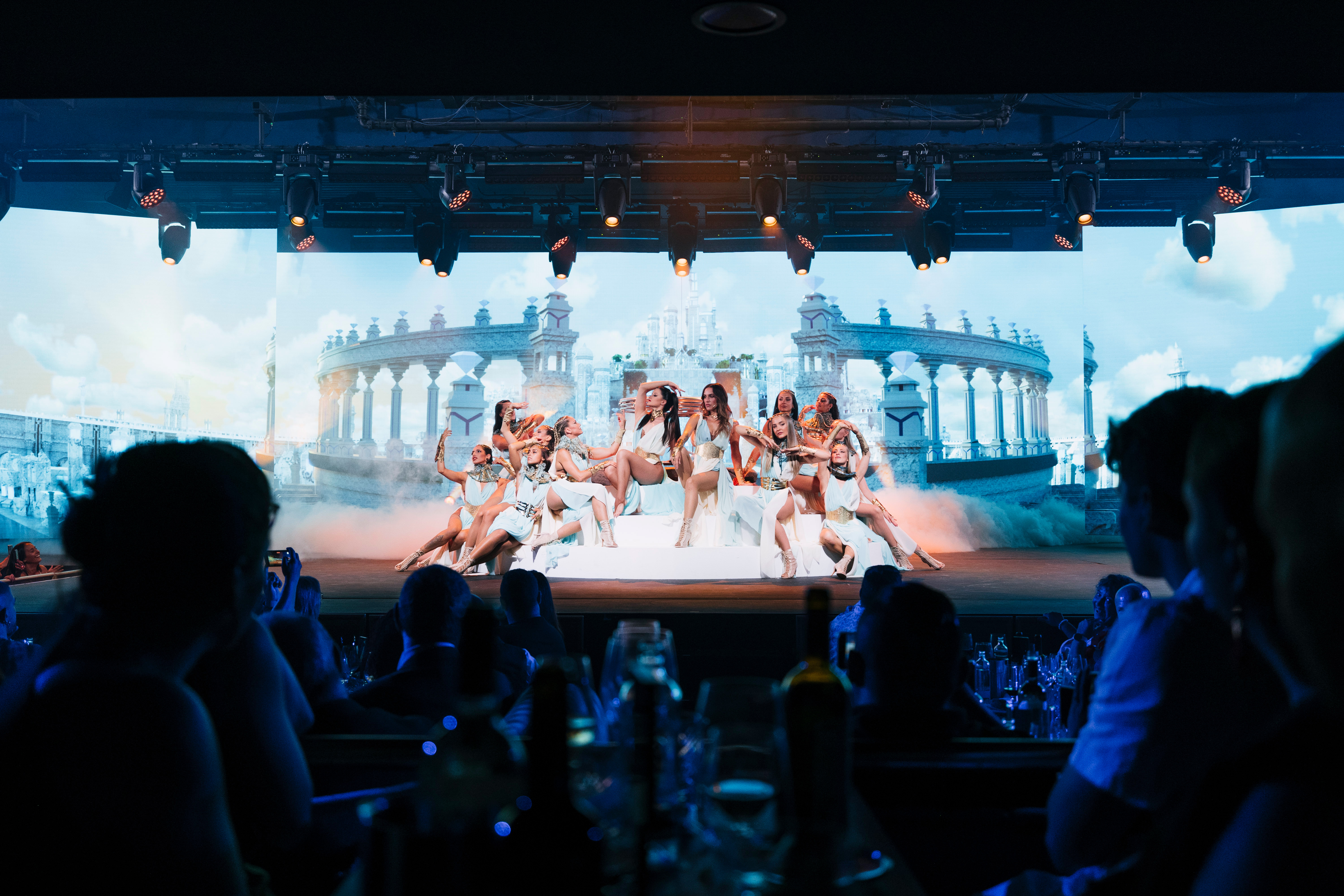 a group of women on a stage