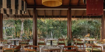 a restaurant with tables and chairs