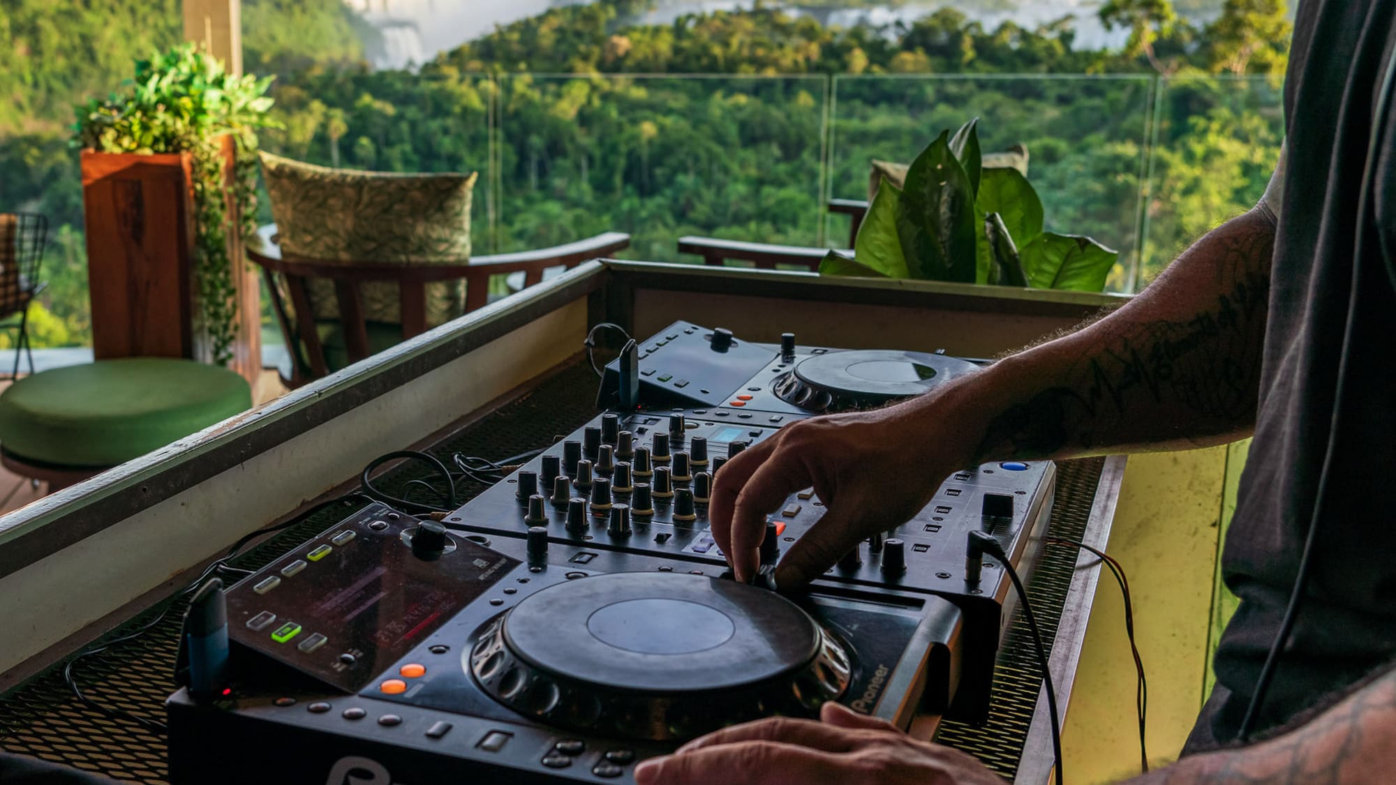 a man playing music on a deck
