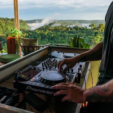 a man playing music on a deck