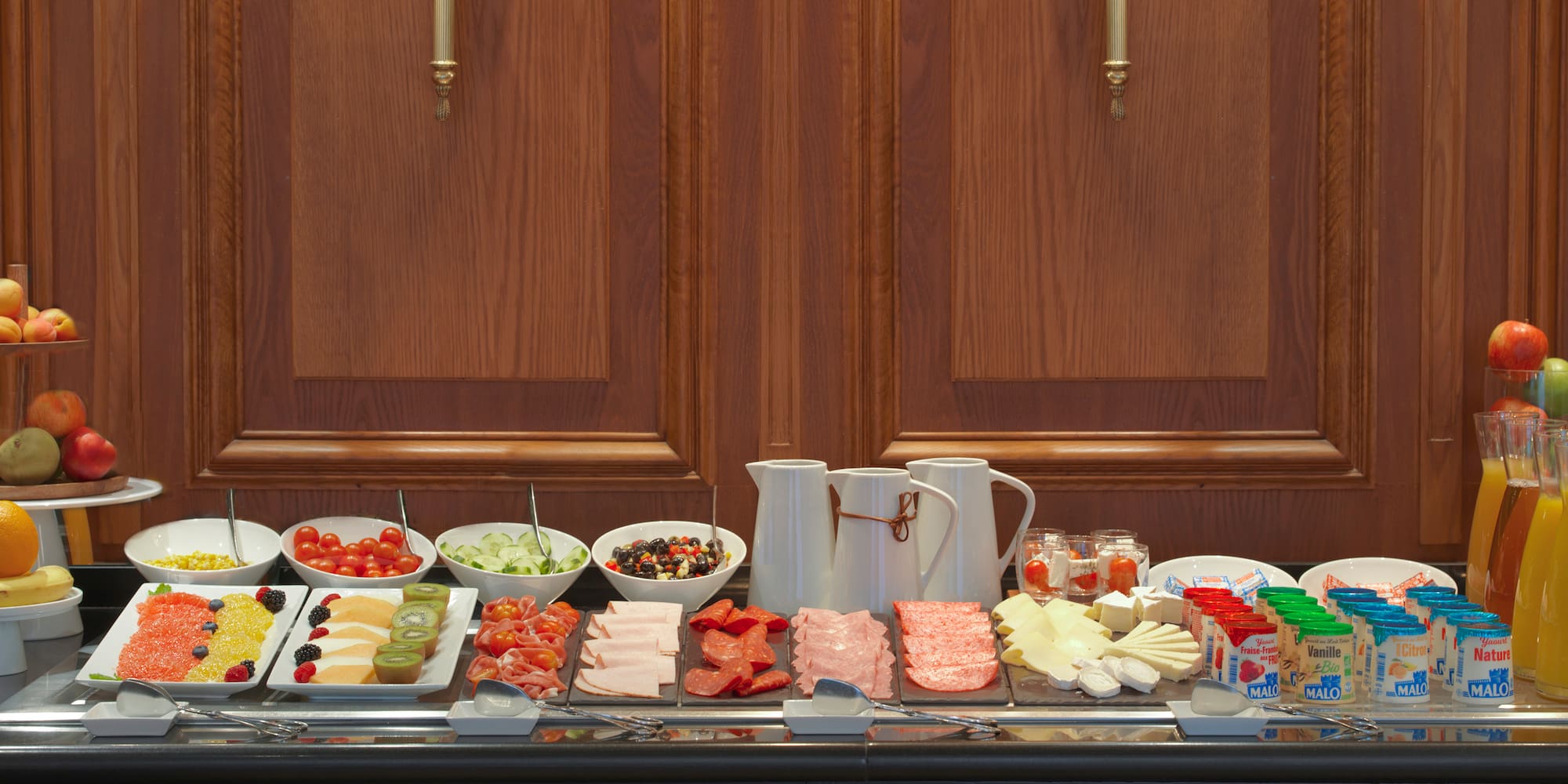 a buffet table with food on it