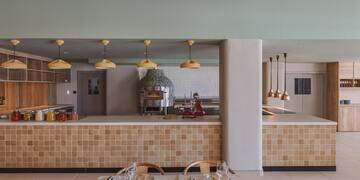 a restaurant with a large counter and a large oven