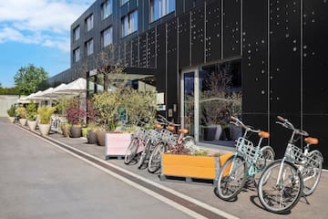 a group of bicycles parked outside a building