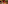 Restaurant interior: red checkered floor, red curtains, dining tables, plants.