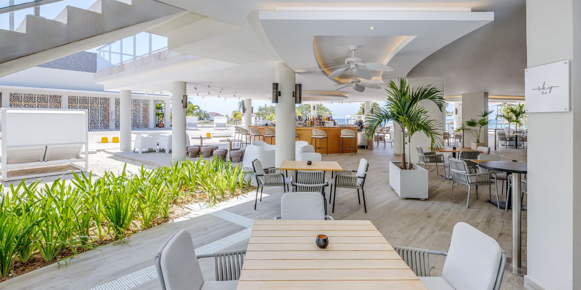 a restaurant with tables and chairs