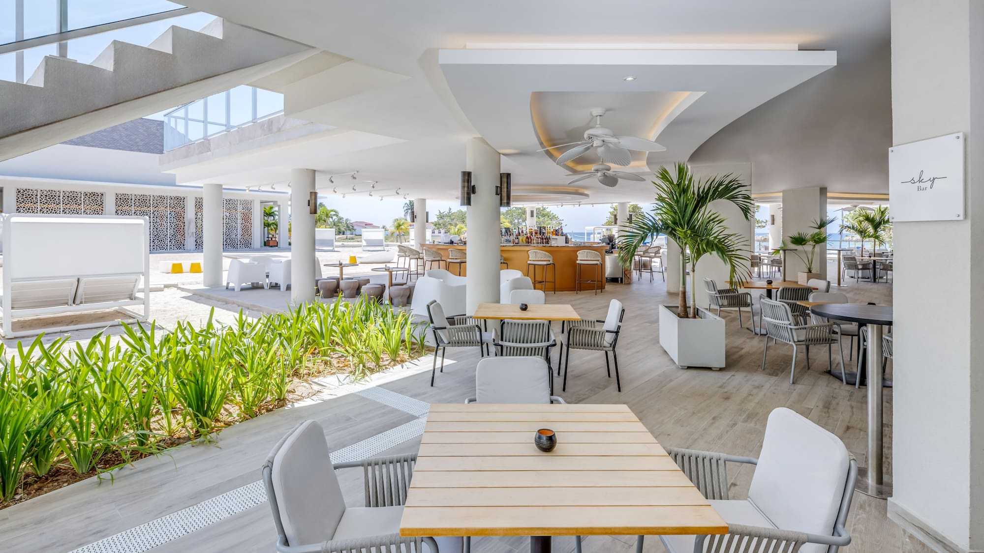 a restaurant with tables and chairs