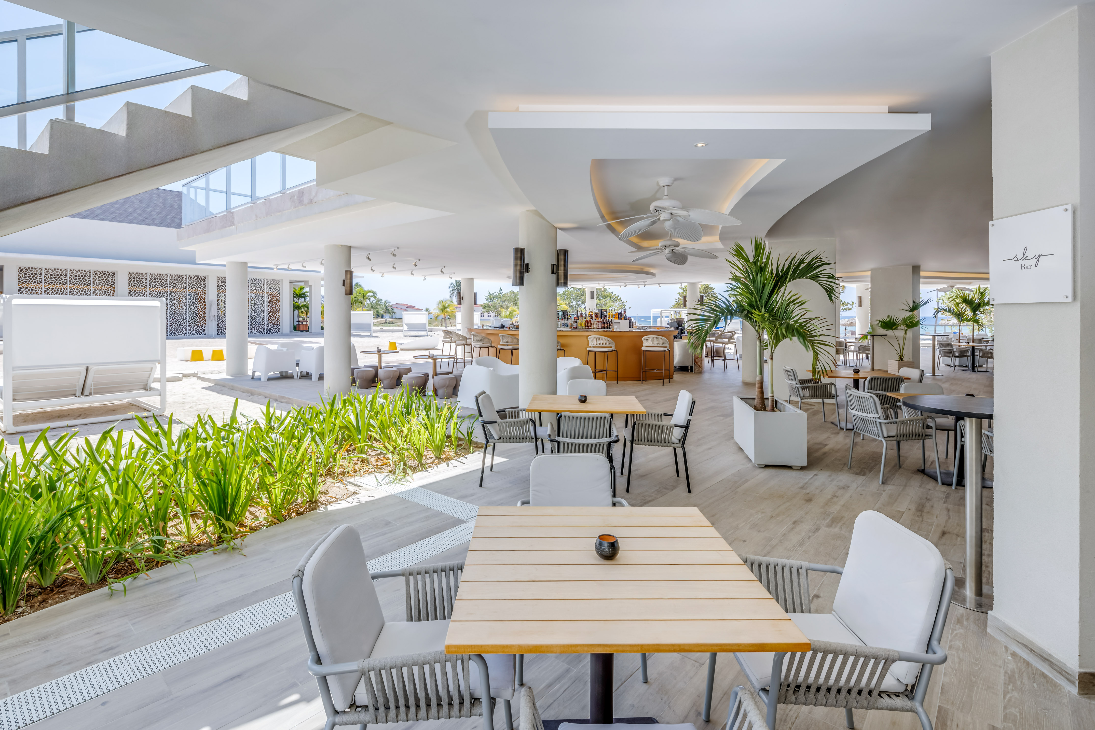 a restaurant with tables and chairs