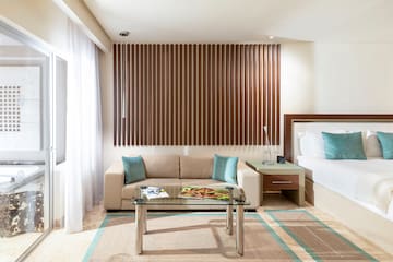 a room with a couch and a coffee table